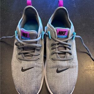 Nike Gray and Pink Athletic Shoes with Modern Silhouette